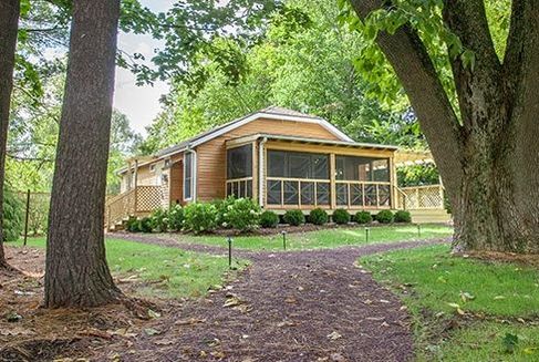 cabin in wooded setting